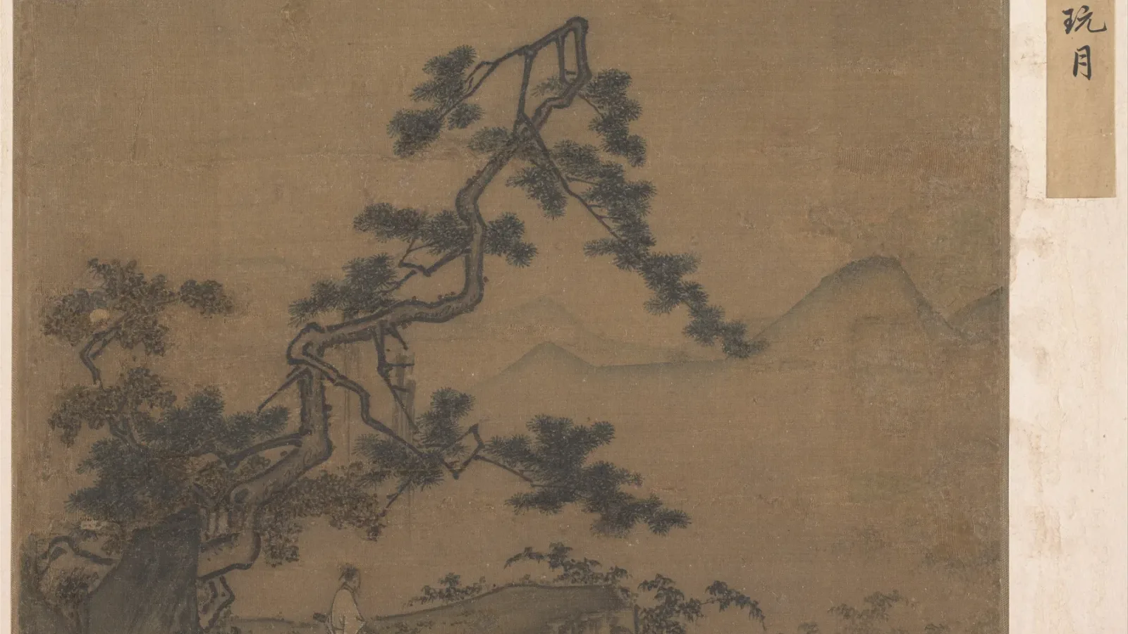 馬遠《松下賞月圖》局部，一株松樹斜出畫面，其餘大片留白。大都會博物館 Open Access 公版影像。